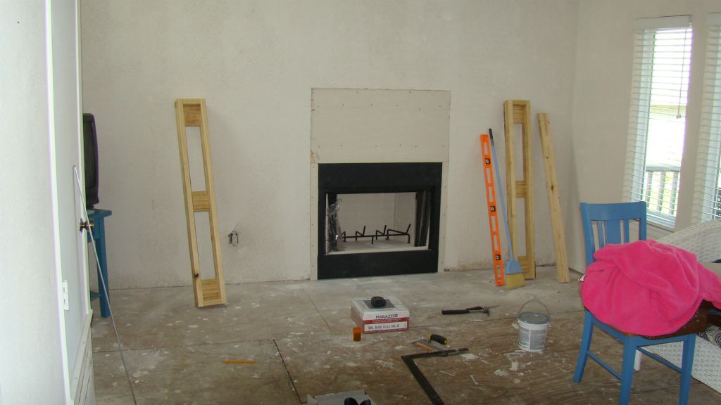 Feature wall getting a fireplace and mantle