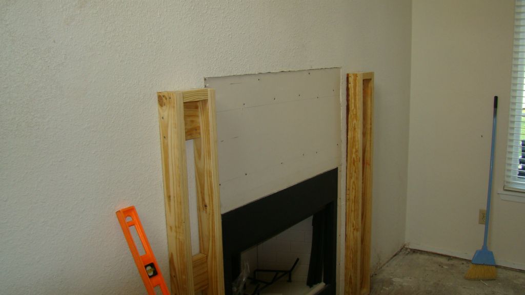 Feature wall getting a fireplace and mantle