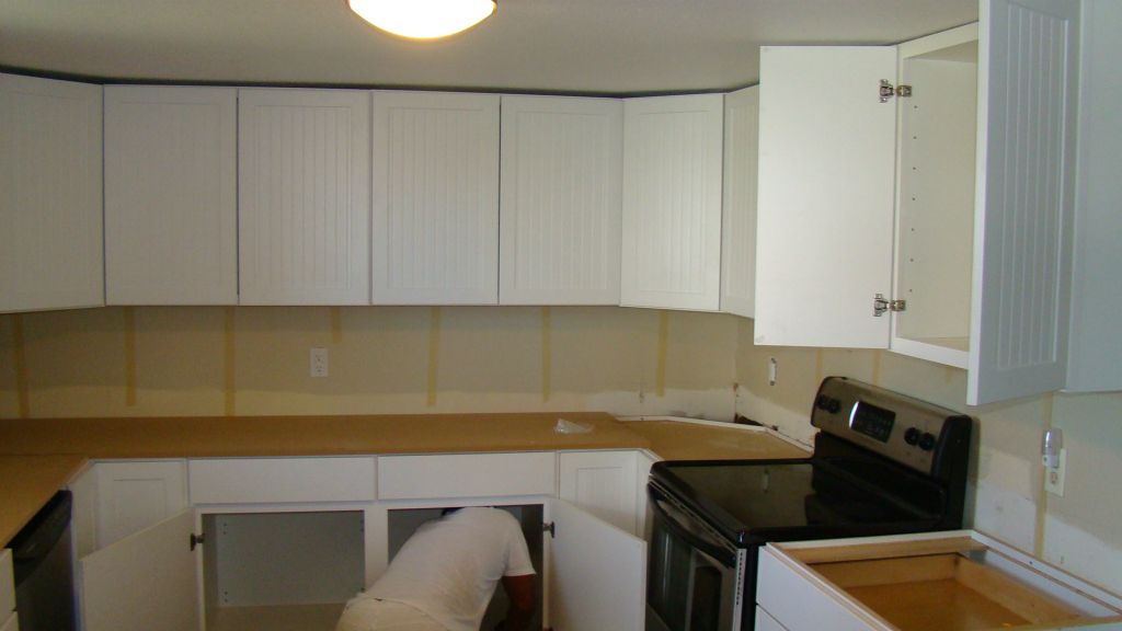 Final adjustments to cabinets prior to installing counter top