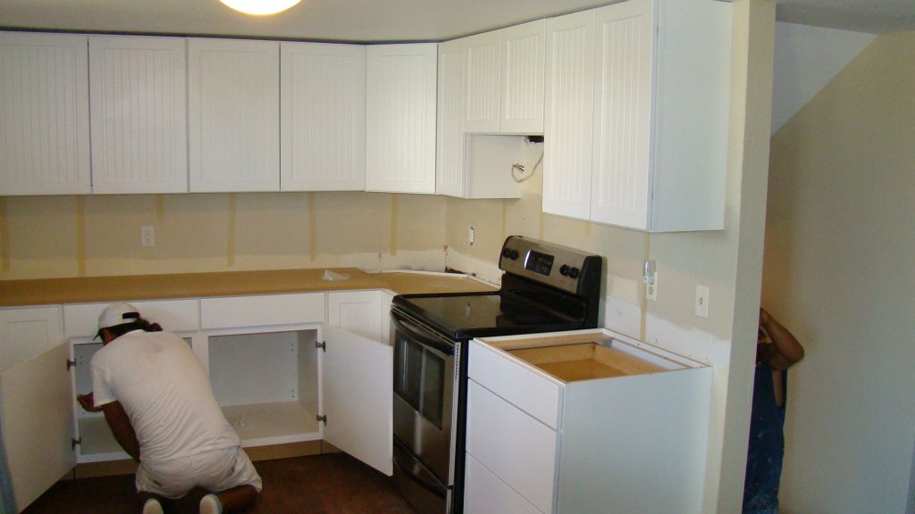 Final adjustments to cabinets prior to installing counter top